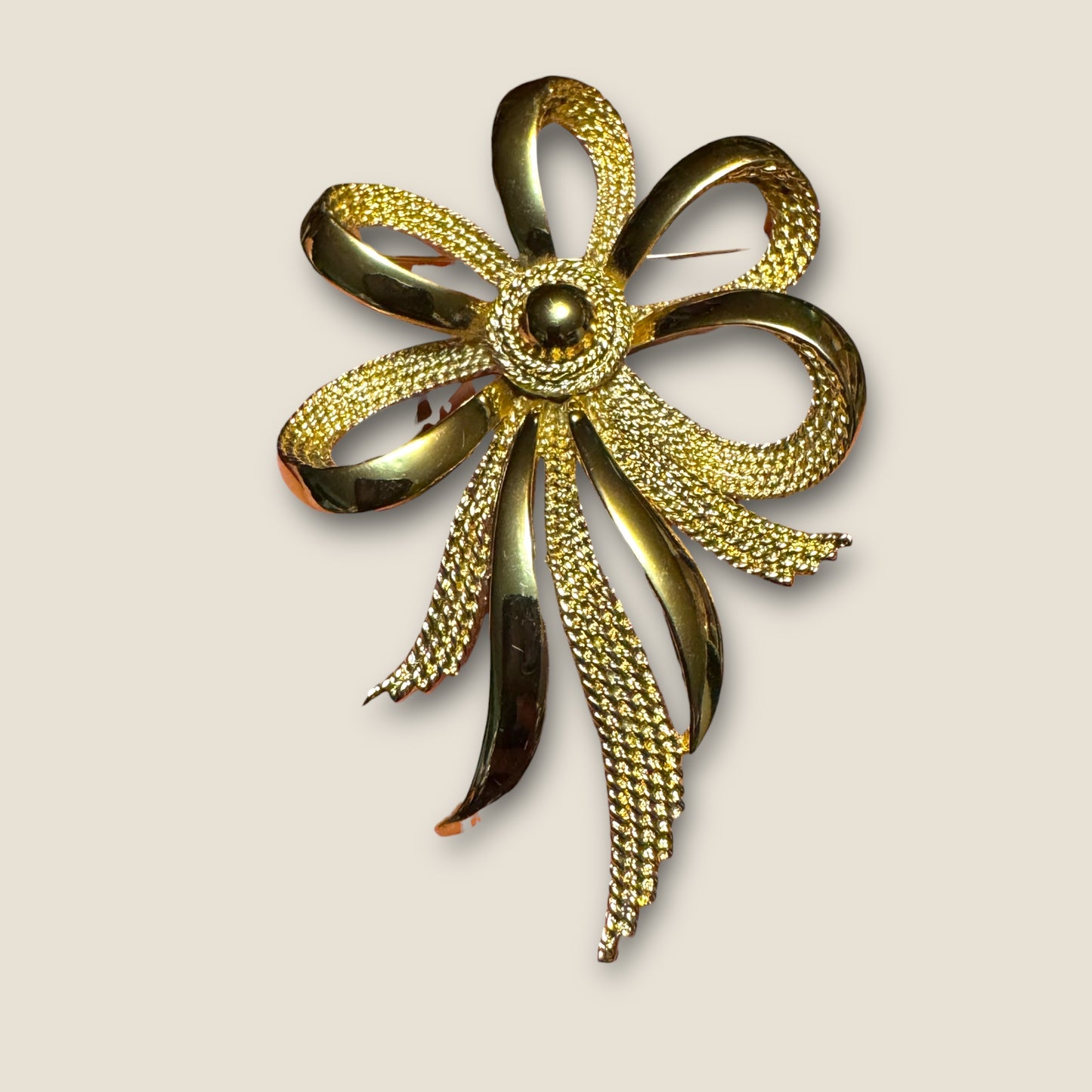 Vintage Monet Gold-Tone Ribbon Statement Brooch – Sculptural Textured Bow Pin