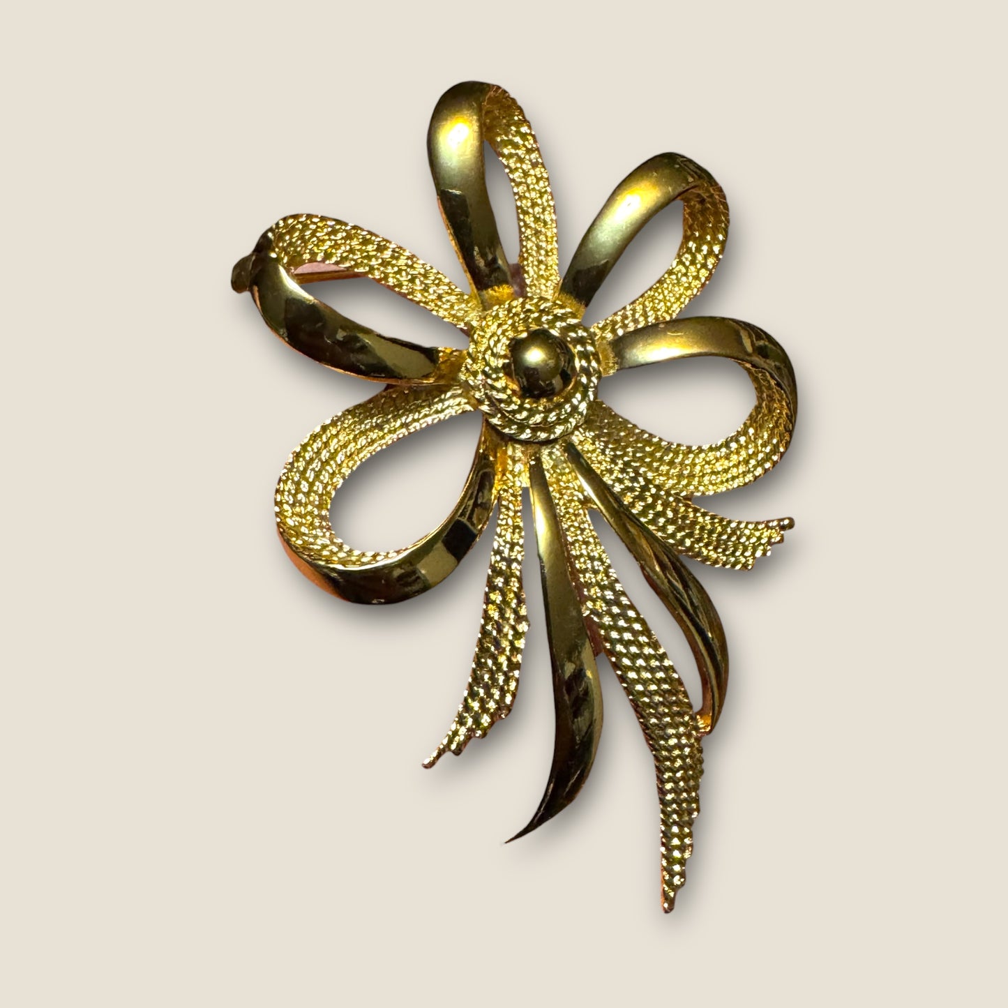 Vintage Monet Gold-Tone Ribbon Statement Brooch – Sculptural Textured Bow Pin