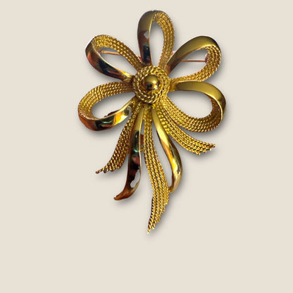 Vintage Monet Gold-Tone Ribbon Statement Brooch – Sculptural Textured Bow Pin