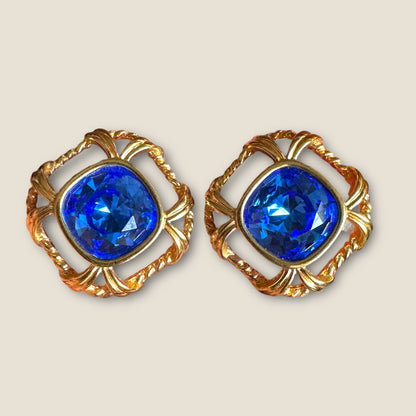 Vintage Swarovski Crystal Knot Earrings with Sapphire Blue Cushion Stones – Signed Swan, Gold-Tone Statement Posts