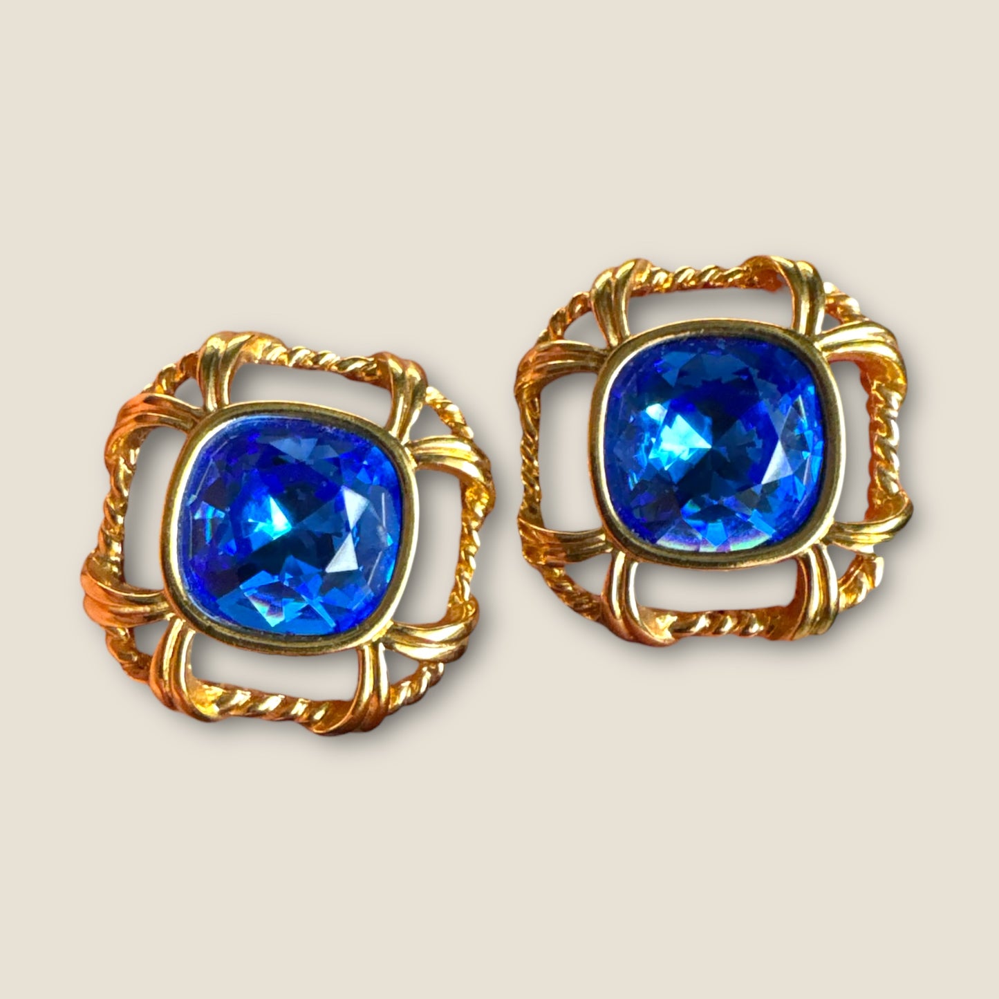 Vintage Swarovski Crystal Knot Earrings with Sapphire Blue Cushion Stones – Signed Swan, Gold-Tone Statement Posts