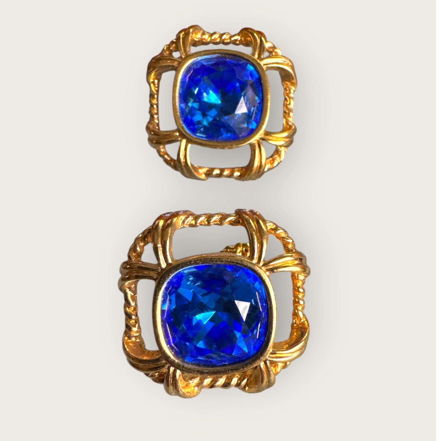 Vintage Swarovski Crystal Knot Earrings with Sapphire Blue Cushion Stones – Signed Swan, Gold-Tone Statement Posts