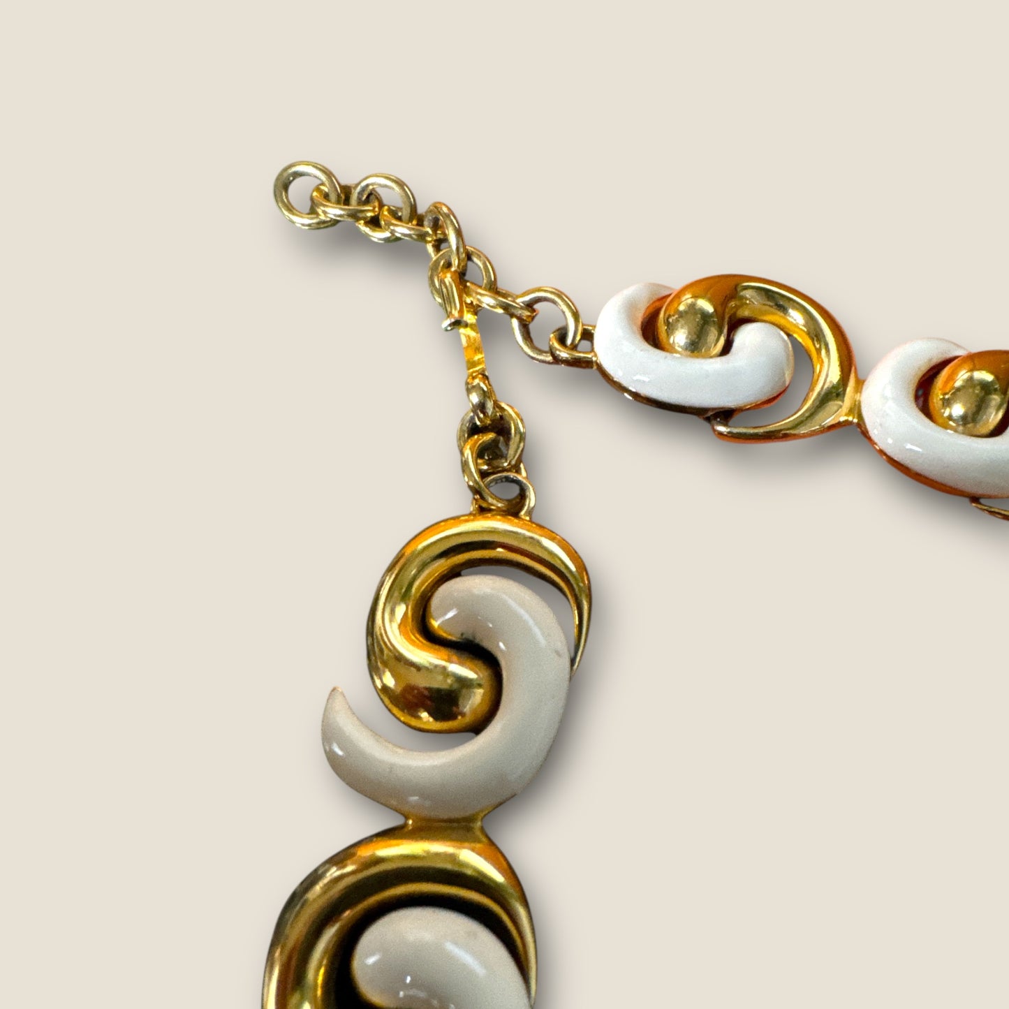 Vintage Monet Cream Enamel Sculptural Swirl Necklace – Gold-Tone Articulated Choker (Signed Monet)