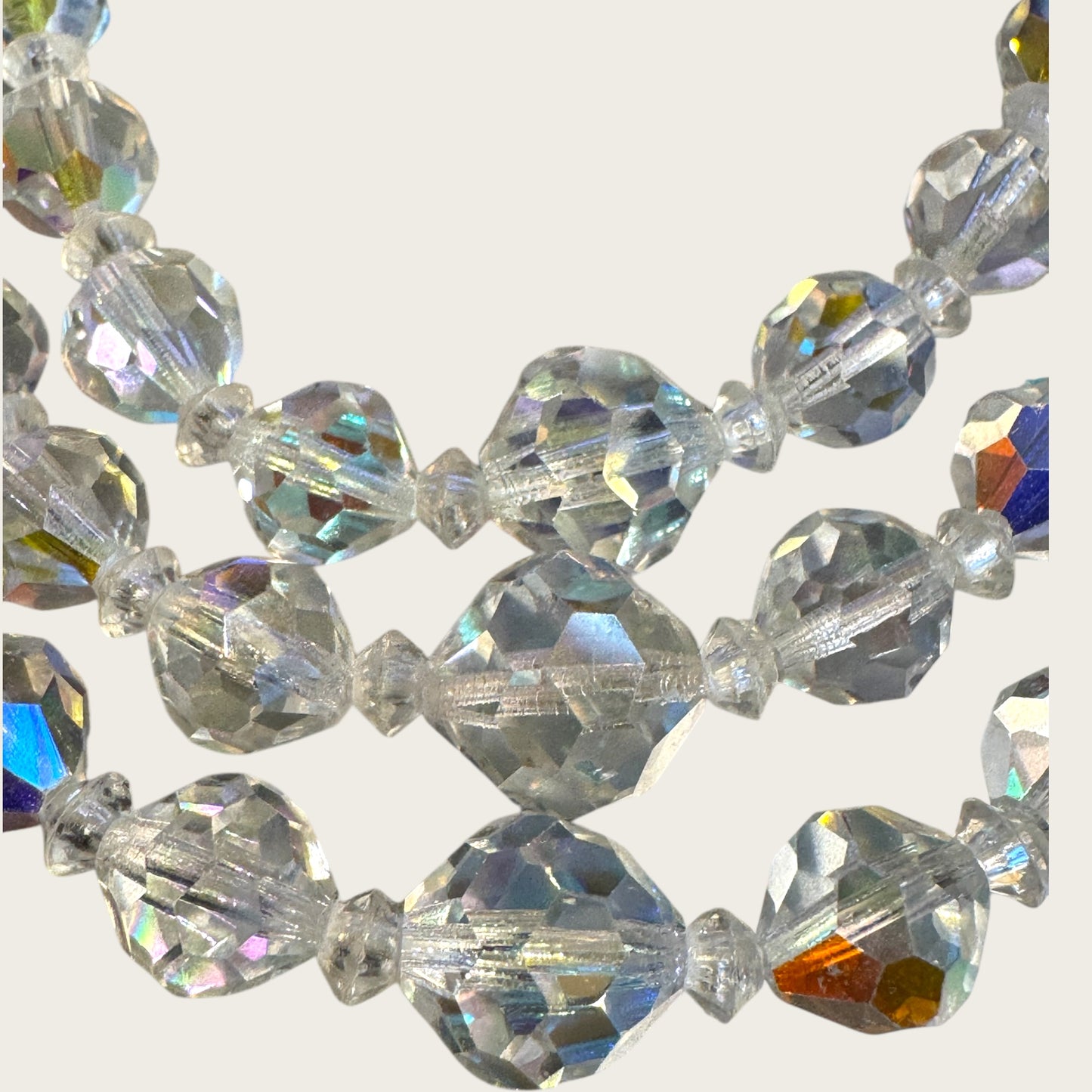 Vintage Aurora Borealis Triple-Strand Crystal Necklace – Faceted Rounds + Bicone Beads, Rhinestone Bar Clasp (1950s–1960s)