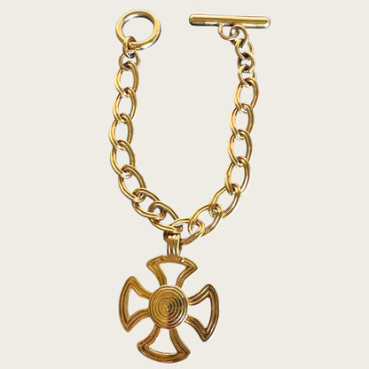Vintage Monet Gold Tone Toggle Necklace with Sculptural Cross Medallion