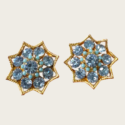 BSK Signed Blue Rhinestone Starburst Clip-On Earrings, Gold Tone Vintage Statement