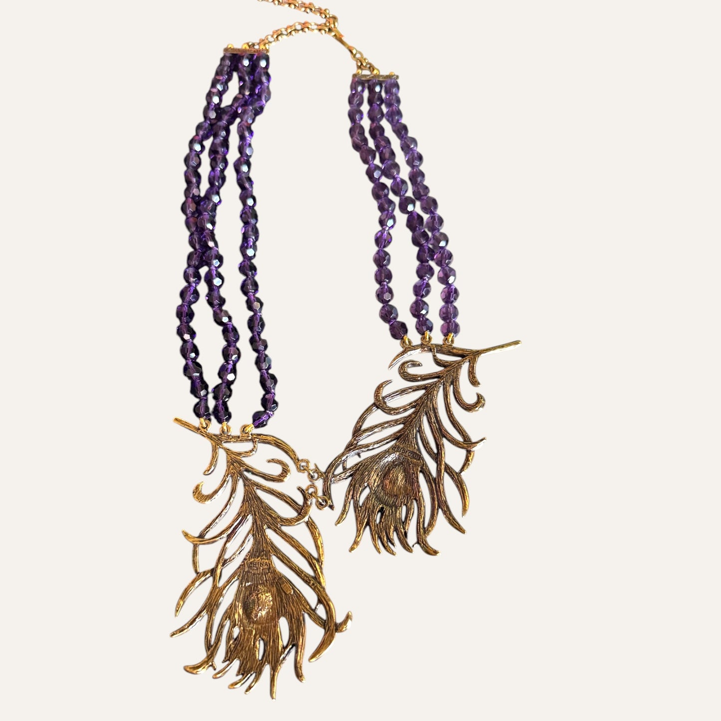 Heidi Daus Multi-Strand Amethyst Crystal Peacock Feather Statement Necklace