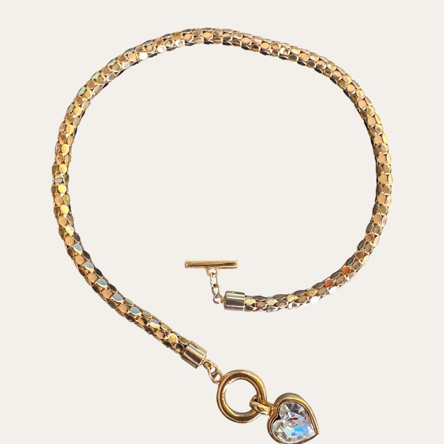 Vintage Givenchy Gold-Tone Mesh Choker Necklace with Foil-Back Crystal Heart Toggle