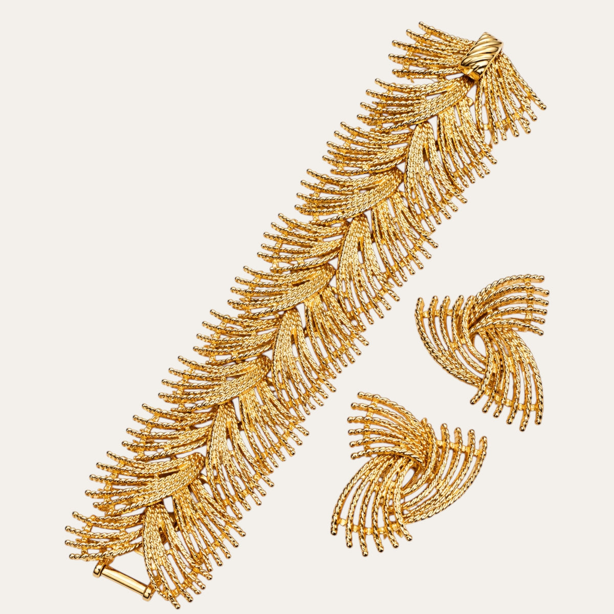 Vintage Sarah Coventry Golden Bouquet bracelet and clip-on earring set circa 1961 in textured gold tone – Betty Lily & Co.